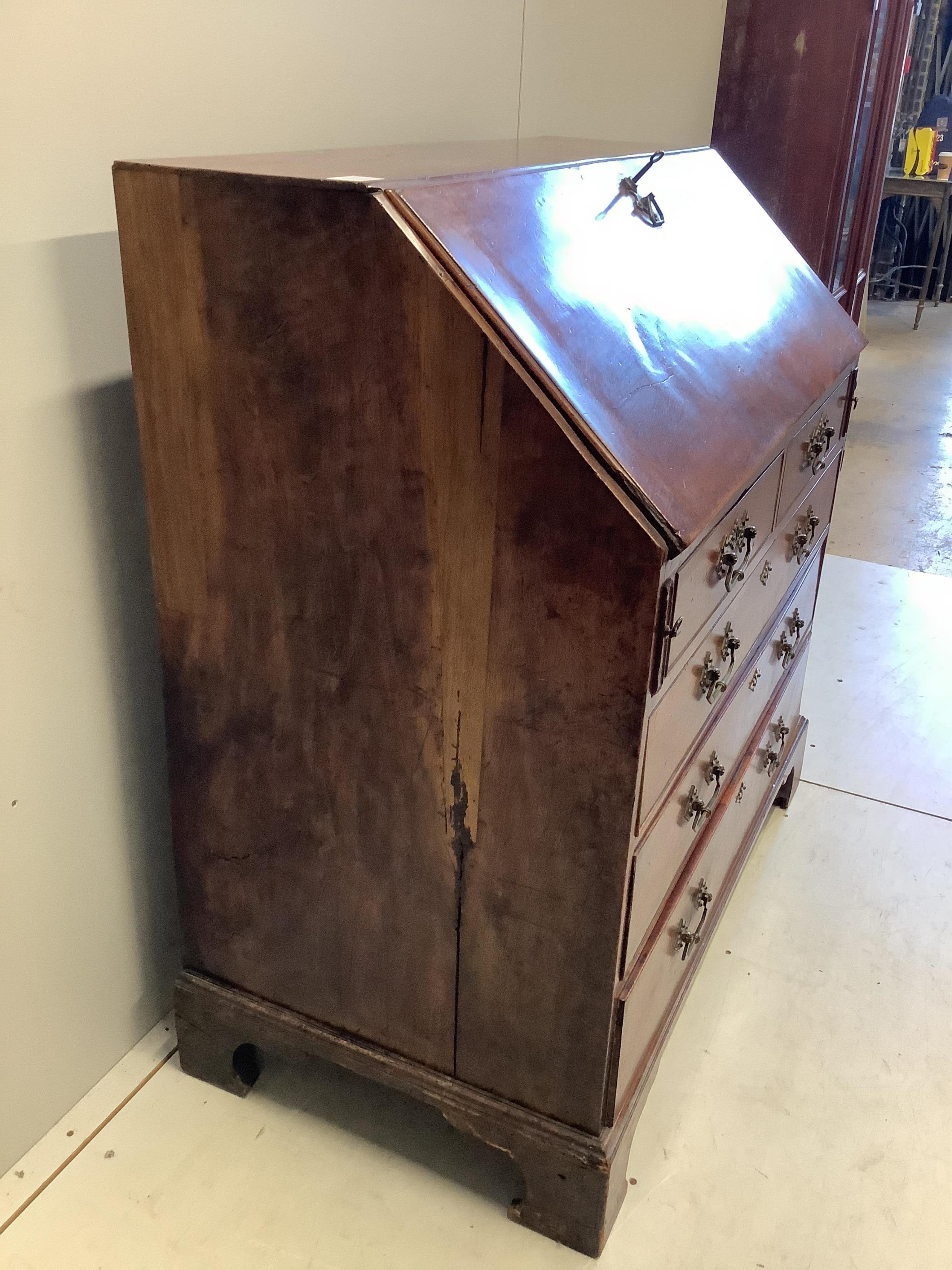 A George III mahogany bureau, width 101cm, depth 55cm, height 108cm. Condition - poor.